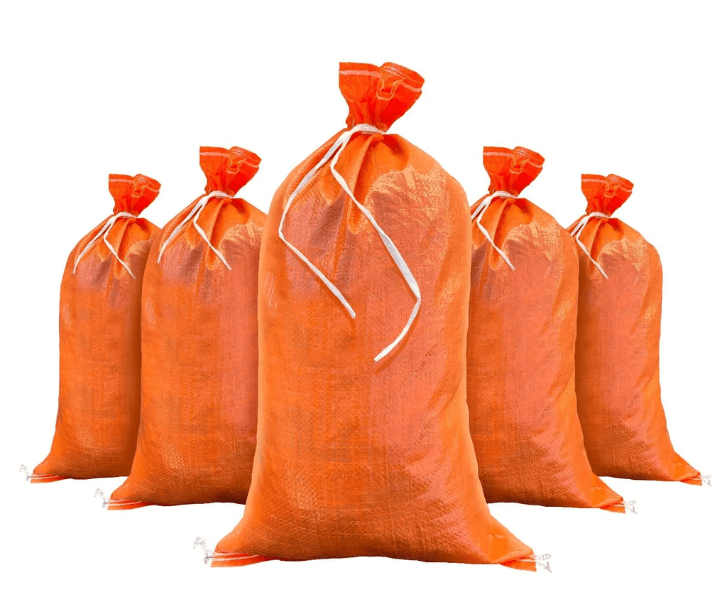 14" x 26" empty orange sandbags with tie strings attached
