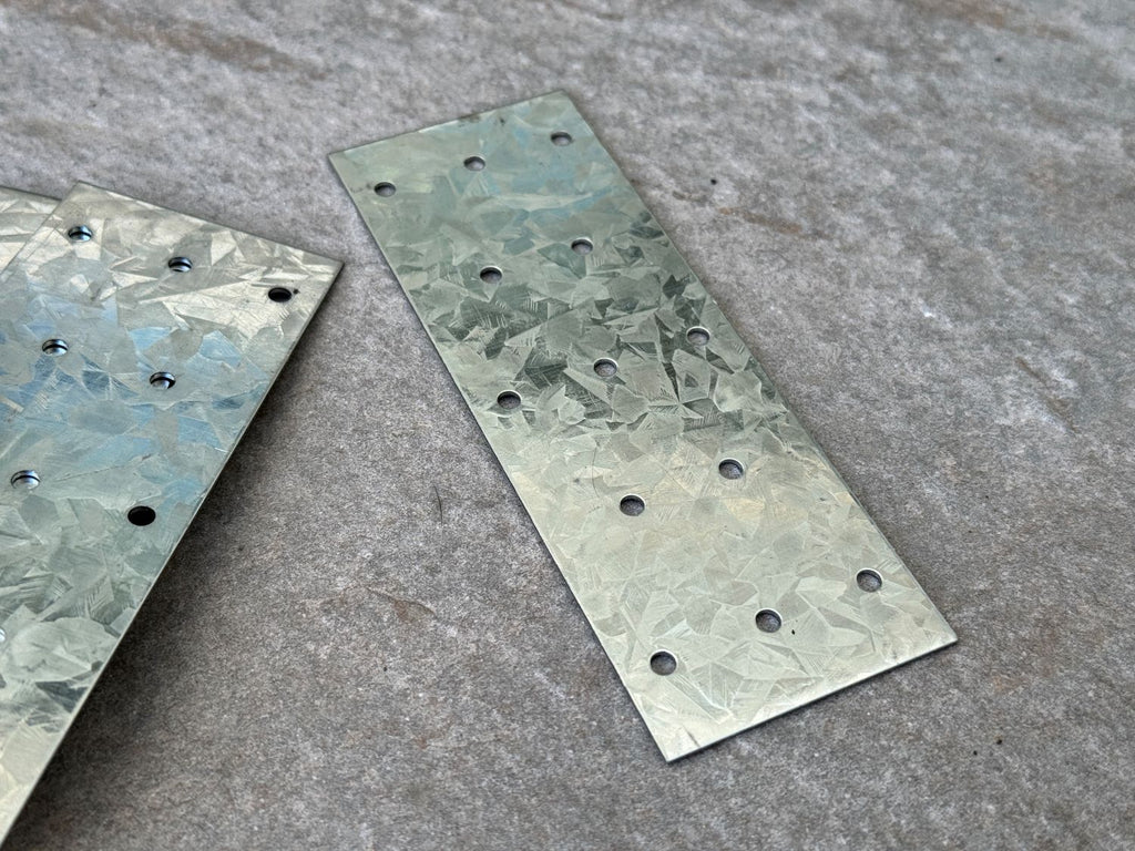 construction grade steel tie plates with 13 nail holes