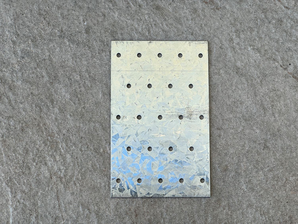 metal tie plates with 1/8" diameter holes for screws and nails