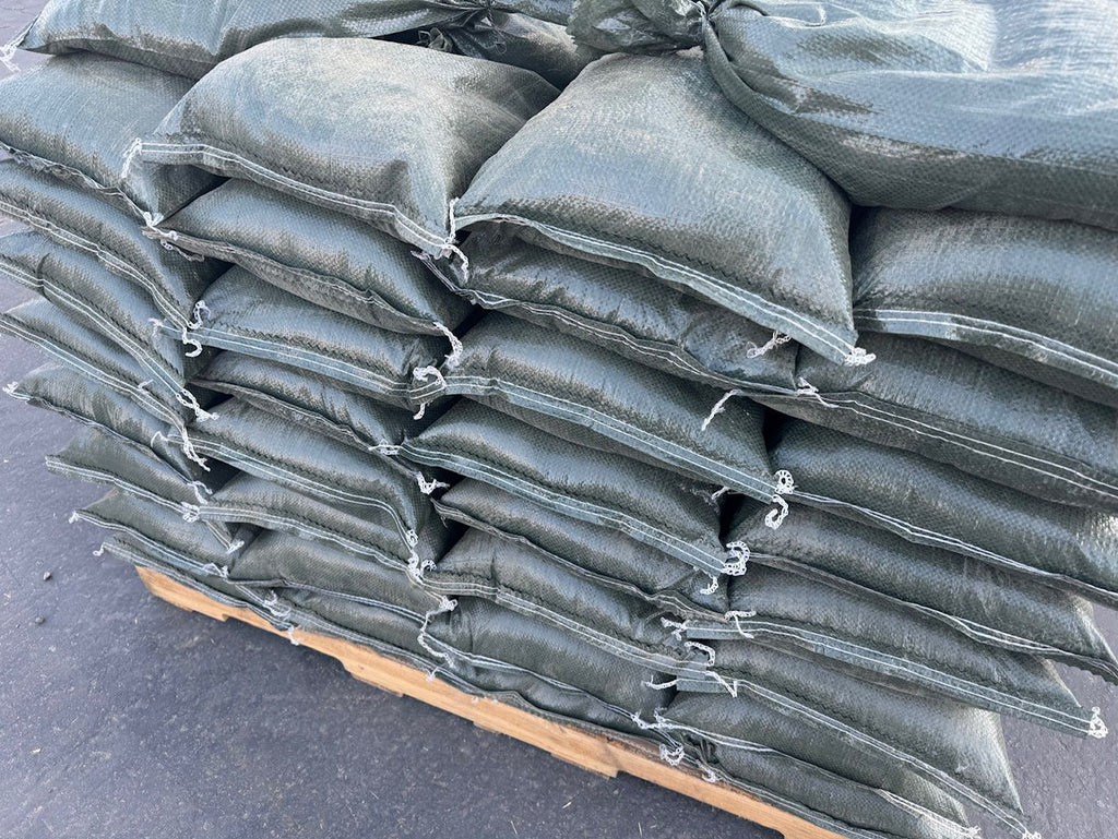 stacked sandbags filled with gravel