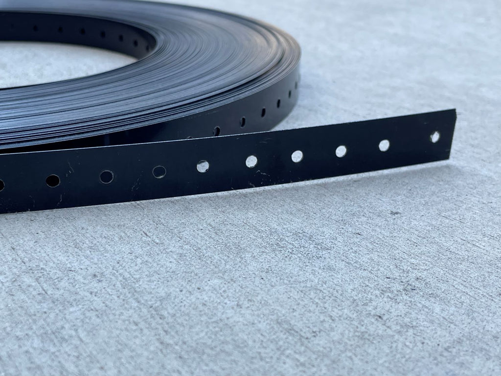 black metal strapping with holes