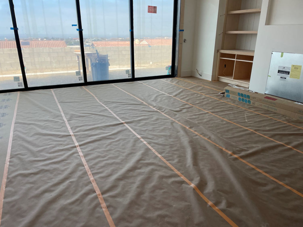 builders paper rolls protecting floors