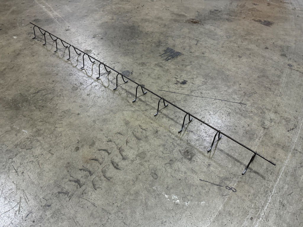 5 ft long continuous slab bolster with grey plastic-coated legs
