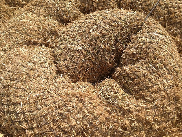 straw wattles erosion control - plastic netting