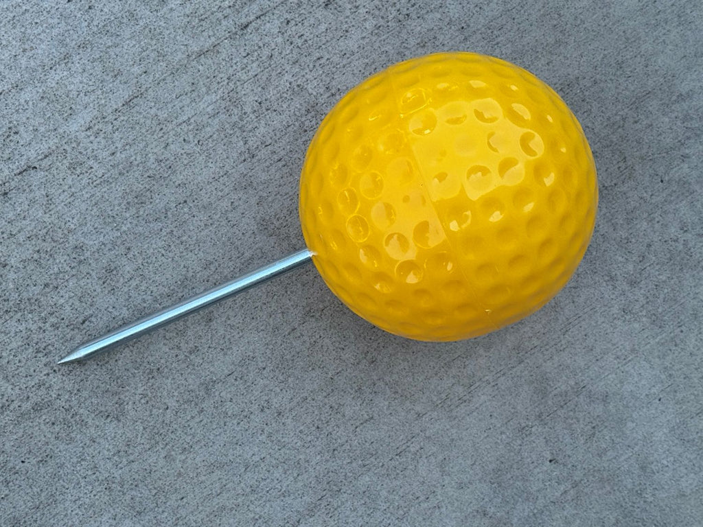 yellow Golf tee marker