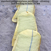 Heavy-duty polyethylene sandbags for rocks and gravel with a 70 lb weight capacity.