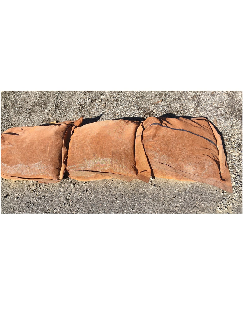 17x27 Monofilament, Long-Lasting Polyethylene Sandbags stacked and in use for erosion control