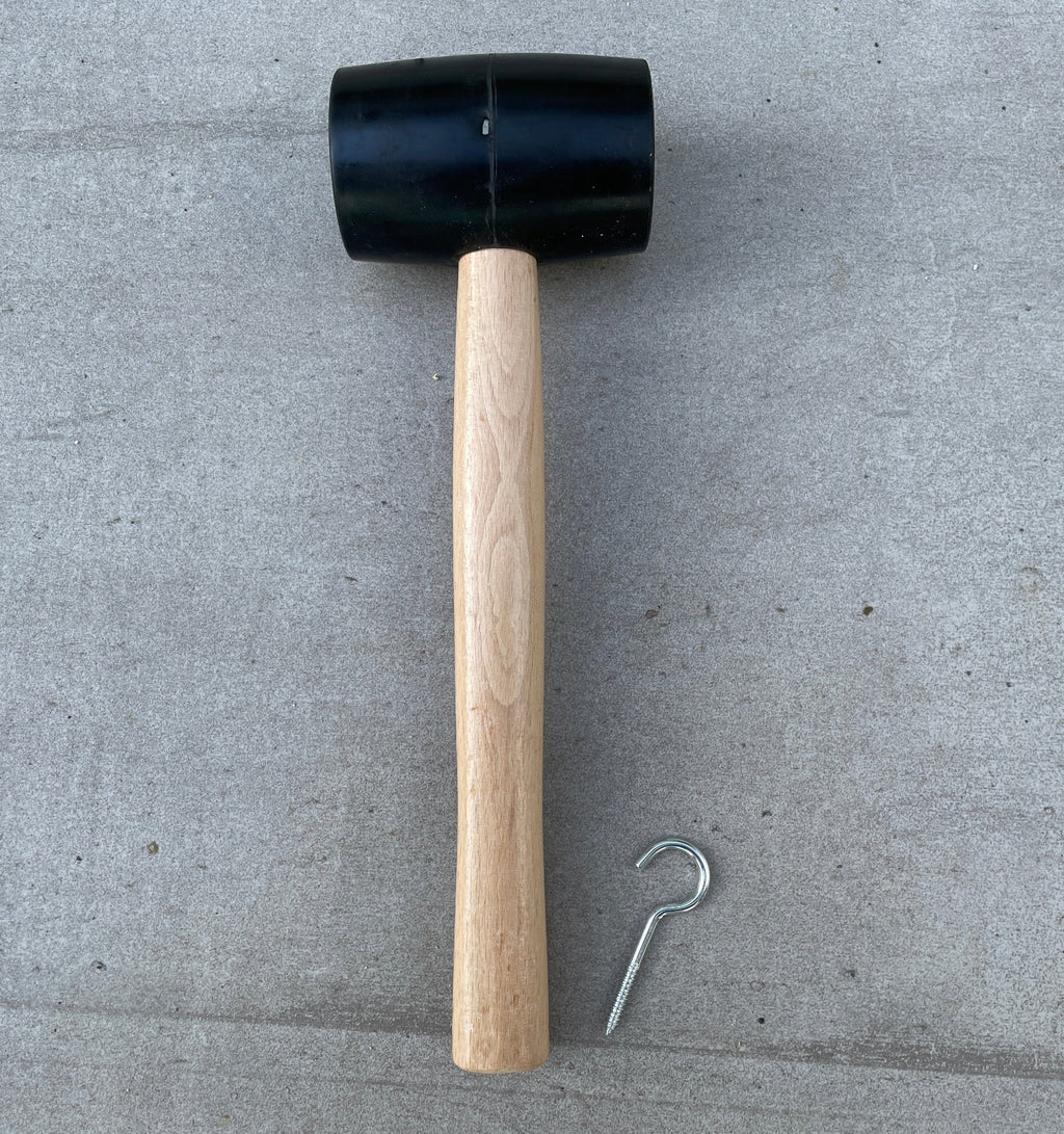 Black rubber mallet with tent peg remover attachment