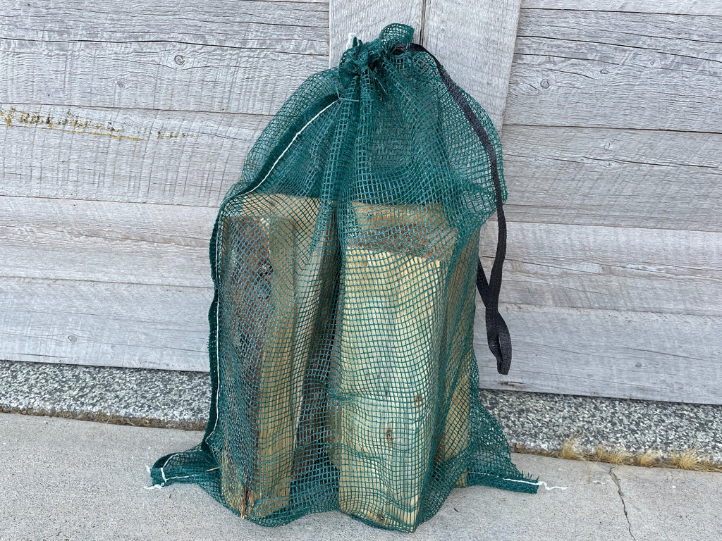durable and reusable mesh bags holding firewood