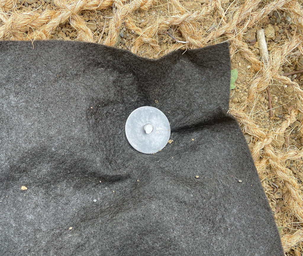 circle top landscape pins for securing landscape fabric and erosion control netting