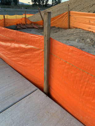 Temporary Silt Fence installed with wood stakes for sediment retention