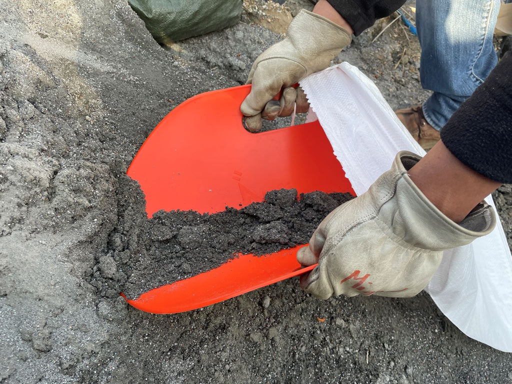 Plastic Sandbag Filling Tool Scoops Sand Directly into Sandbag
